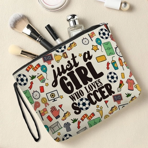 Canvas soccer makeup bag with Girl Who Loves Soccer print and various cosmetics