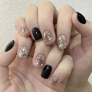 Handmade short square black press-on nails with sparkling star glitter and silver rhinestones