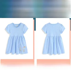 Detail of light blue short sleeve knit dress featuring unicorn embroidery and floral print