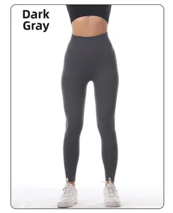 Detail shot of seamless high waist yoga leggings in dark grey color and stretchy fabric