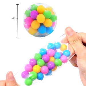 Detail view of 6.0cm colorful sensory stress ball with transparent shell and soft beads