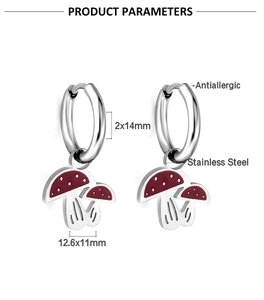 Detail of red mushroom earrings in stainless steel with precise size measurements