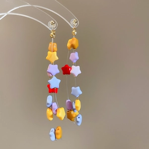 Handmade long drop earrings featuring colorful star beads and elegant gold metal studs