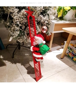 Climbing Santa Claus on red ladder with star topper and green gift bag for Christmas
