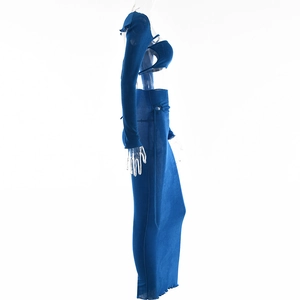 Side view detail of a blue three-piece knit set featuring a tube top and long maxi skirt