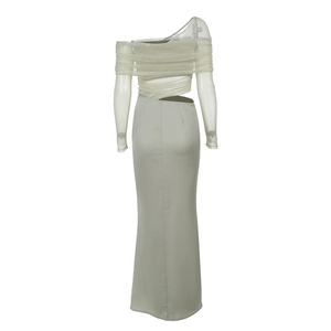 Detailed view of off-shoulder mesh stitching and ruched satin fabric on the elegant dress