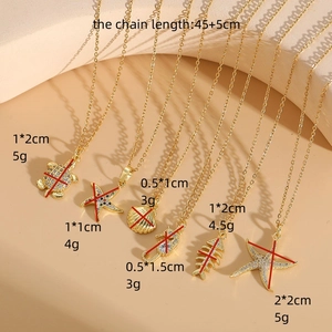 Gold ocean theme necklaces featuring zircon sea creatures like turtles and starfish