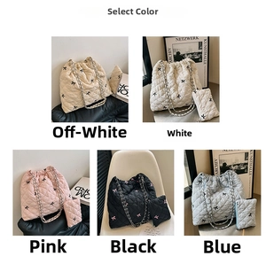 Quilted bow tote bag with matching chain pouch shown in five diverse trendy colors