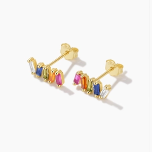 Macro shot of S925 silver earrings featuring colorful rectangular cubic zirconia stones