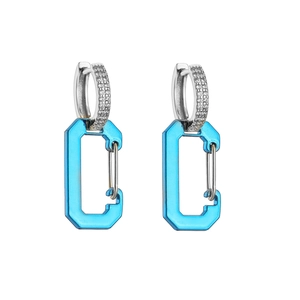 Detail of silver carabiner earrings with sparkling pave zircon and blue transparent drops