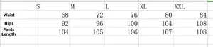 Detailed size guide table for women flare denim jeans with waist and hip measurements
