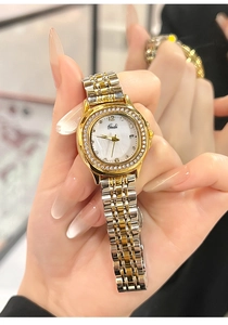 Macro detail of Gedi luxury women watch with mop dial and crystal bezel