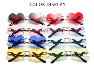 Color palette of bat-wing heart sunglasses with metal frames in eight vibrant shades
