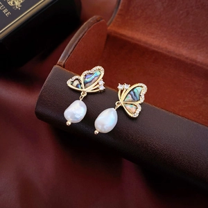 Vintage gold butterfly earrings with freshwater baroque pearls and sparkling zircons