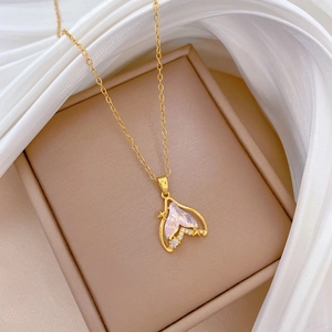 Elegant gold titanium necklace with sparkling fishtail pendant and colorful opal stone