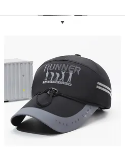 Detail view of the black and grey running hat featuring reflective strips and adjustable cord