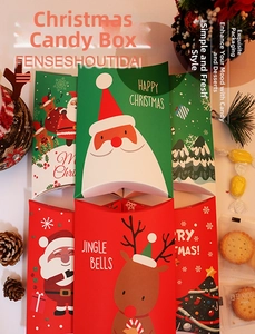 Macro view of festive pillow-shaped Christmas candy gift boxes with reindeer motifs