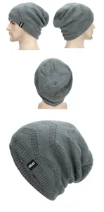 Detail showing the gray knitted sport beanie with soft fleece lining and sport label
