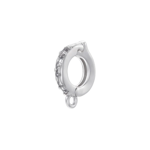 Macro detail of silver clasp accessory with zircon inlay and small round connector ring
