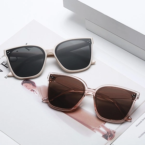 Vintage oversized square sunglasses for women with UV protection in beige and tea colors