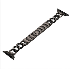 Detailed view of dark metal chain watch strap with rectangular links and connectors