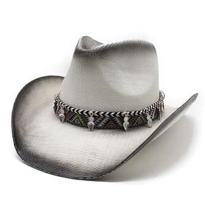 Vintage hand-painted cowboy straw hat with ethnic band and silver leaf charms on white back