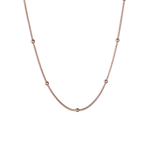 Minimalist 18K rose gold snake chain necklace featuring elegant small golden beads design