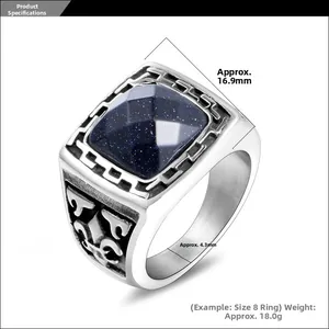 Detail view of vintage men's ring with rectangle blue sandstone and floral relief carving