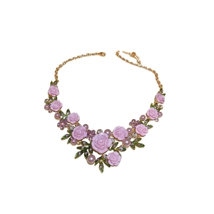 Elegant floral necklace with pink camellia, pearls and crystals on a gold chain