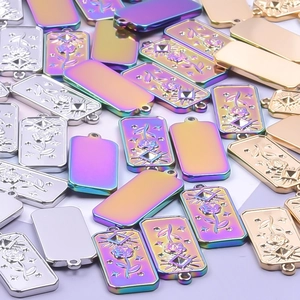 Stainless steel rose and eye pendant necklaces in gold, silver, and rainbow colors