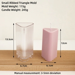 Small triangular ribbed candle mold with a pink textured wax candle on wood base