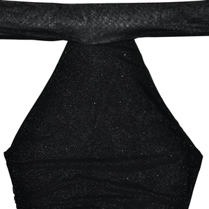 Detail of black shimmering fabric with reflective particles on a sexy halter neck dress