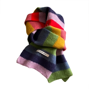 Colorful rainbow striped mohair scarf for women featuring a soft knitted texture on white