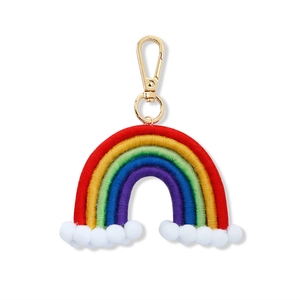 Detail of handmade woven rainbow car pendant with colorful cotton rope and soft white pom-poms