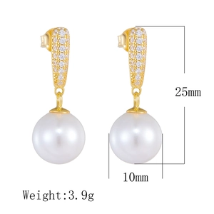Detail showing 25mm length pearl earrings with 10mm white pearls and zircon accents