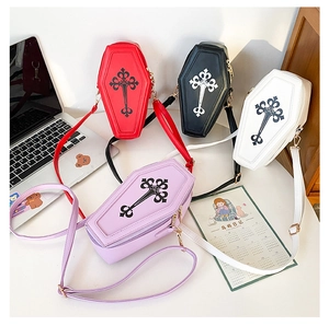 Gothic coffin-shaped crossbody bags featuring cross prints in black, red, white, and purple