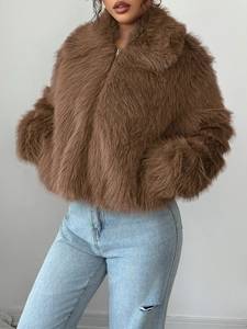 Elegant brown faux fur jacket for women featuring a zip-up front and plush texture