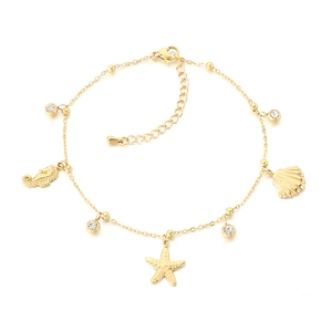 Tobillera dorada tema marino con dijes de estrella de mar concha caballito y cristales