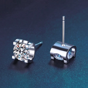 Detailed view of 925 silver stud earrings with D-color moissanite in classic 4-prong setting