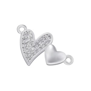 Close-up of dual heart jewelry connector featuring pave-set zircons and polished silver finish