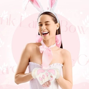 Detail of pink bunny ears headband, satin bow tie, and plush paw gloves for Easter costume