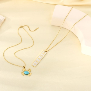 18K gold plated stainless steel necklace with blue stone crab pendant and rectangle bar charm