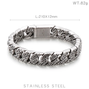 Macro view showing 210mm vintage engraved stainless steel links and clasp details