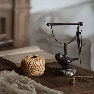 European vintage cast iron twine holder with bird base and black metal scissors