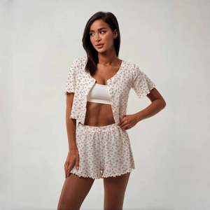 Women's 3-piece floral pajama set with short sleeve cardigan and ruffle trim shorts