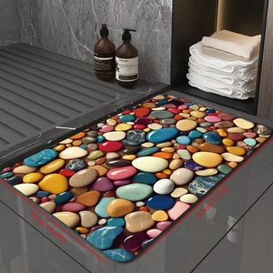 Detailed view of colorful pebble pattern bath mat with size 50x80cm in a bathroom