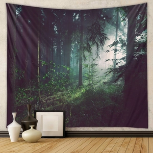 Detail of forest tapestry with misty trees and sunbeams in a minimalist home interior