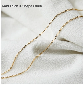Close-up detail of a thick 18K gold plated stainless steel O-chain necklace link