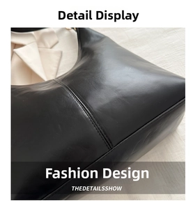 Detailed view of black PU leather texture and precise stitching on the shoulder tote bag