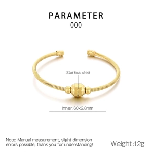 Detailed technical view of a 60mm twisted wire stainless steel cuff with golden finish